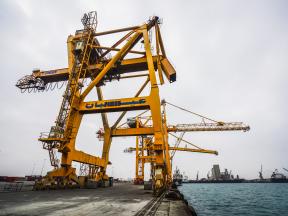 Broken and twisted gantry cranes stand over the port of Al Hudaydah Yemen